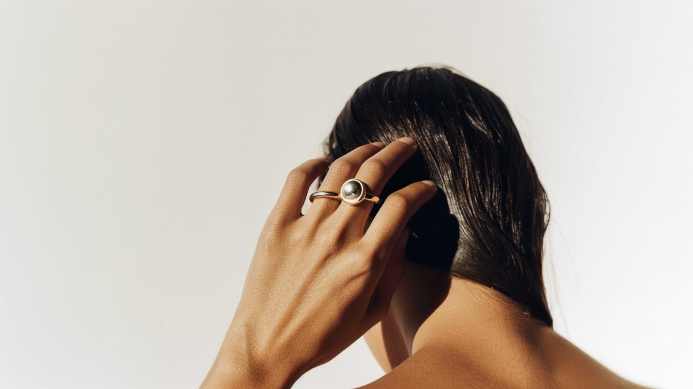 Modern gold and silver jewelry for women from Gleam & Form Jewelry