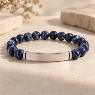 Premium studio image of the Engravable Natural Stone Bar Bracelet in Sodalite with blank stainless steel engraving bar